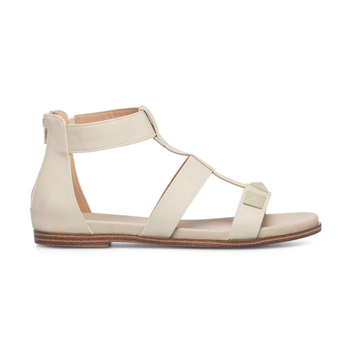 Sandali bassi beige da donna con borchie a piramide Lora Ferres