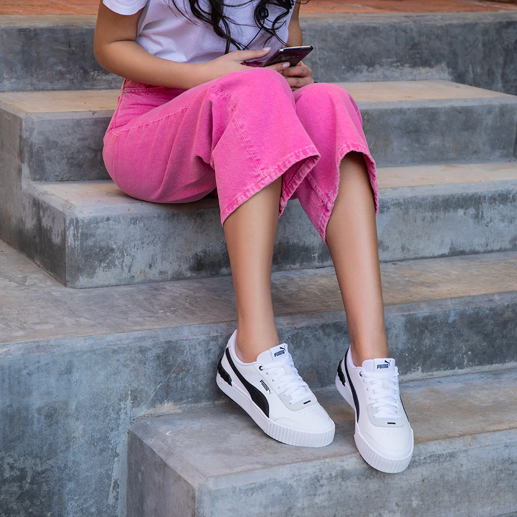 Sneakers bianche con striscia laterale a contrasto Puma Carina Lift