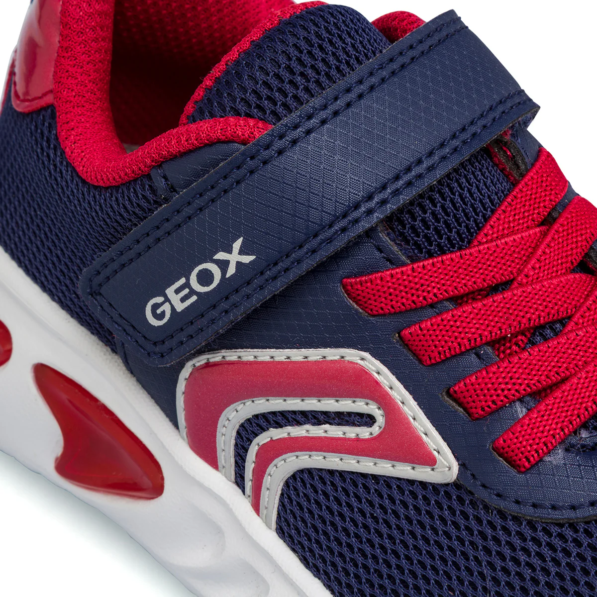 Sneakers blu e rosse da Bambino con suola traspirante e luci Geox - Image 6