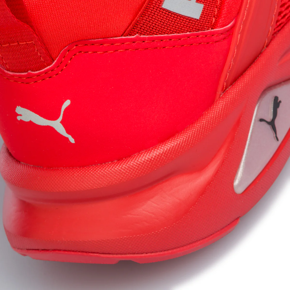 Sneakers rosse in tessuto con inserti elastici Puma Enzo 2 Weave Jr - Image 7