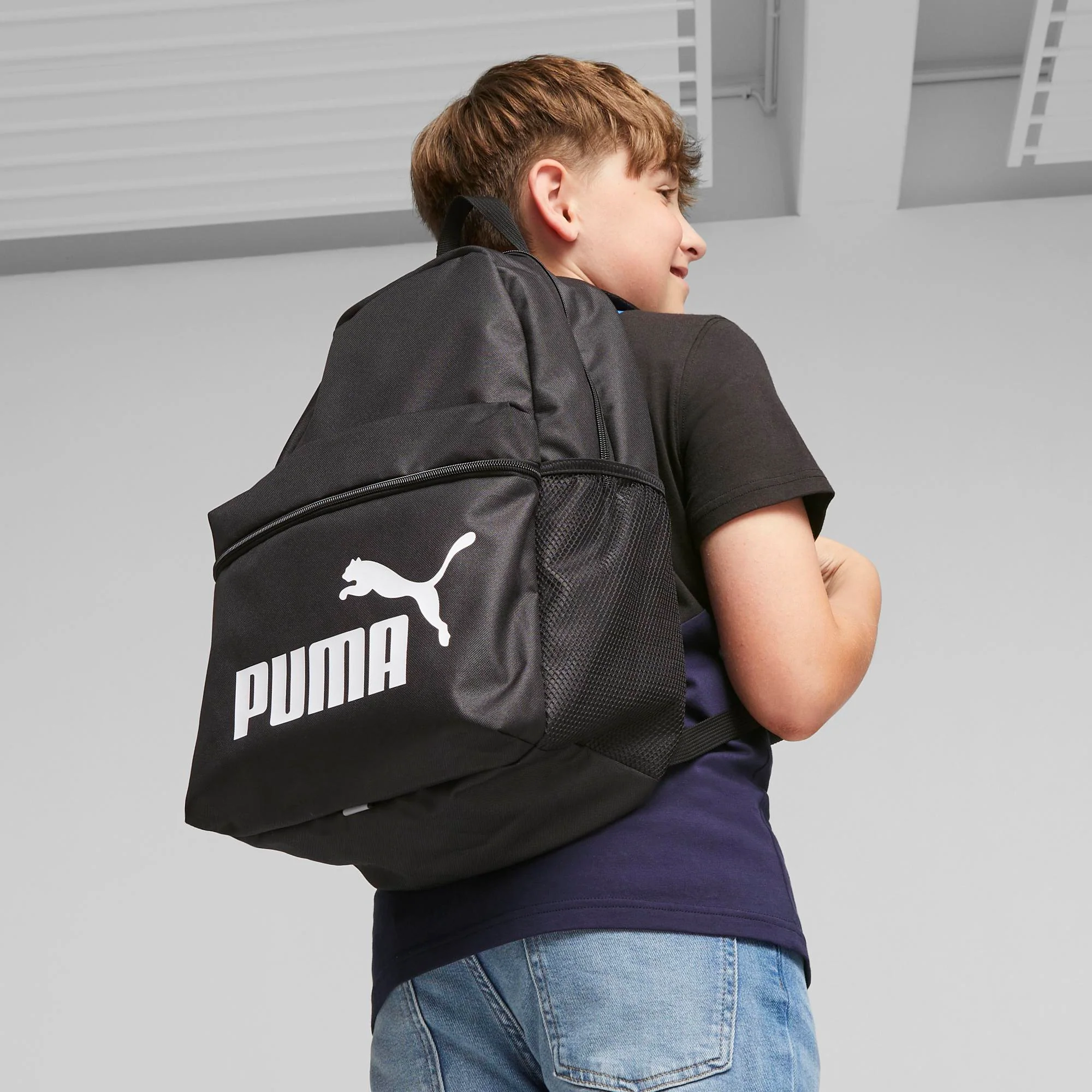 Zaino nero con zip e logo bianco Puma Phase